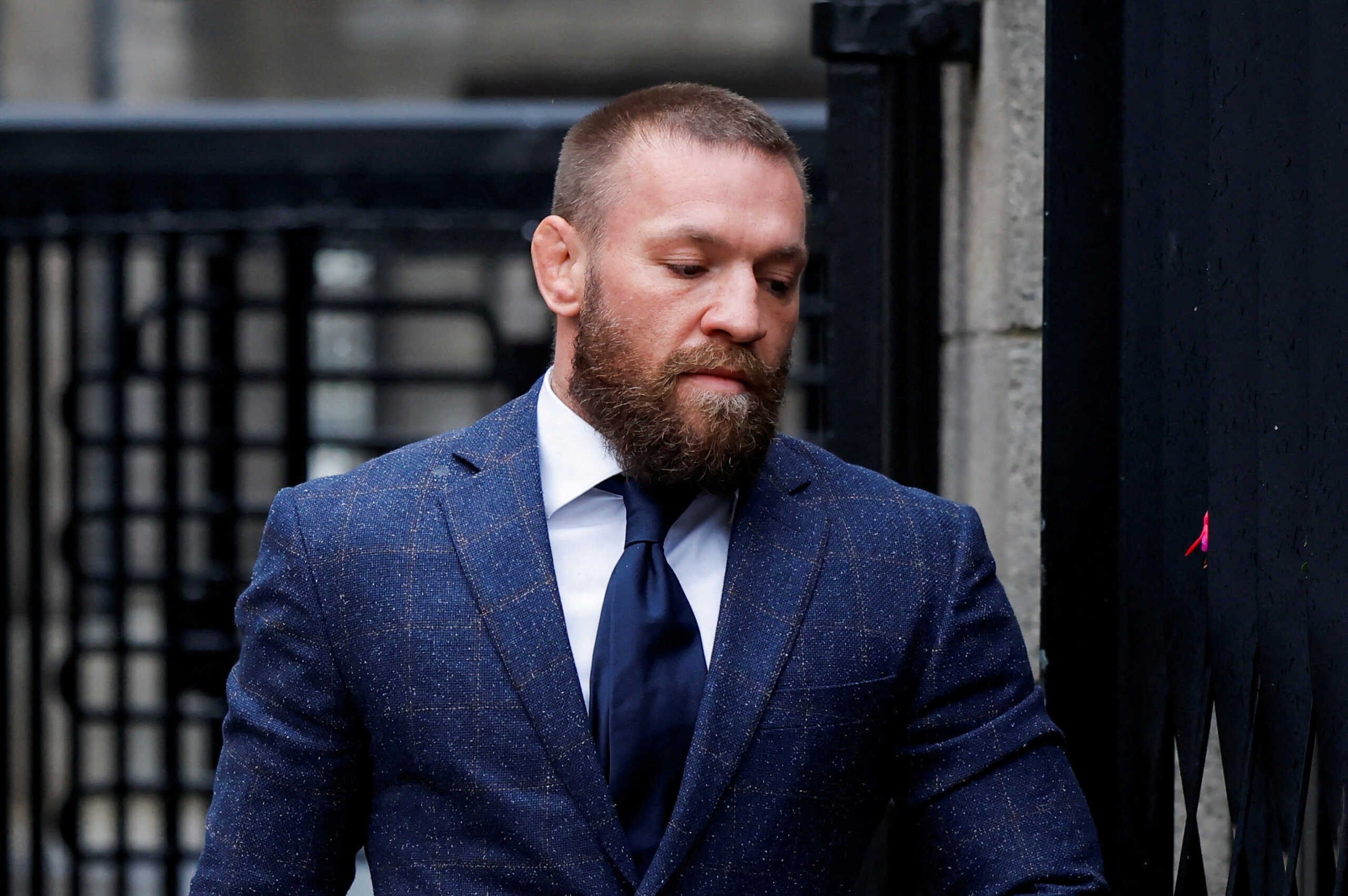 FILE PHOTO: Irish mixed martial arts fighter Conor McGregor arrives at court, on the day he attends a civil trial on allegations of sexual assault, in Dublin, Ireland November 19, 2024. REUTERS
