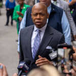 NYC Mayor Eric Adams speaks to the media after attending Rosh Hashanah services at the East Side Synagogue in New York City, U.S., October 3, 2024. REUTERS