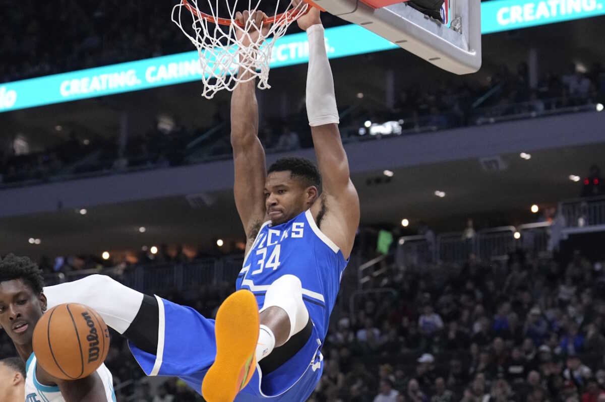 Nov 23, 2024; Milwaukee, Wisconsin, USA; Milwaukee Bucks forward Giannis Antetokounmpo (34) dunks the ball against Charlotte Hornets in the first half at Fiserv Forum. Mandatory Credit: Michael McLoone-Imagn Images