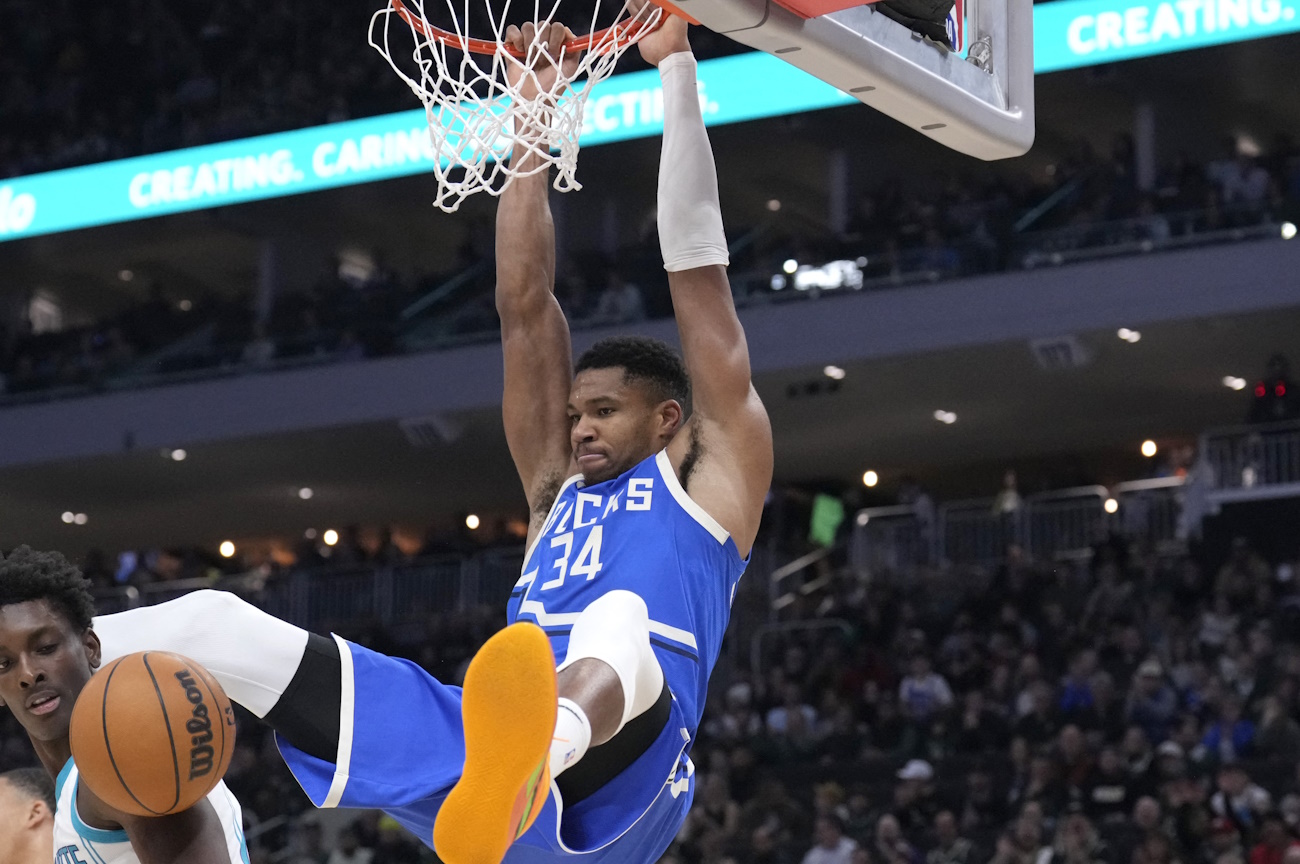 Nov 23, 2024; Milwaukee, Wisconsin, USA; Milwaukee Bucks forward Giannis Antetokounmpo (34) dunks the ball against Charlotte Hornets in the first half at Fiserv Forum. Mandatory Credit: Michael McLoone-Imagn Images