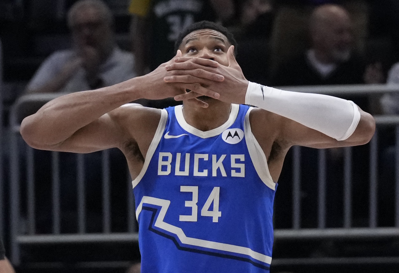 Nov 23, 2024; Milwaukee, Wisconsin, USA; Milwaukee Bucks forward Giannis Antetokounmpo (34) celebrates making a basket after being fouled against the Charlotte Hornets in the second half at Fiserv Forum. Mandatory Credit: Michael McLoone-Imagn Images