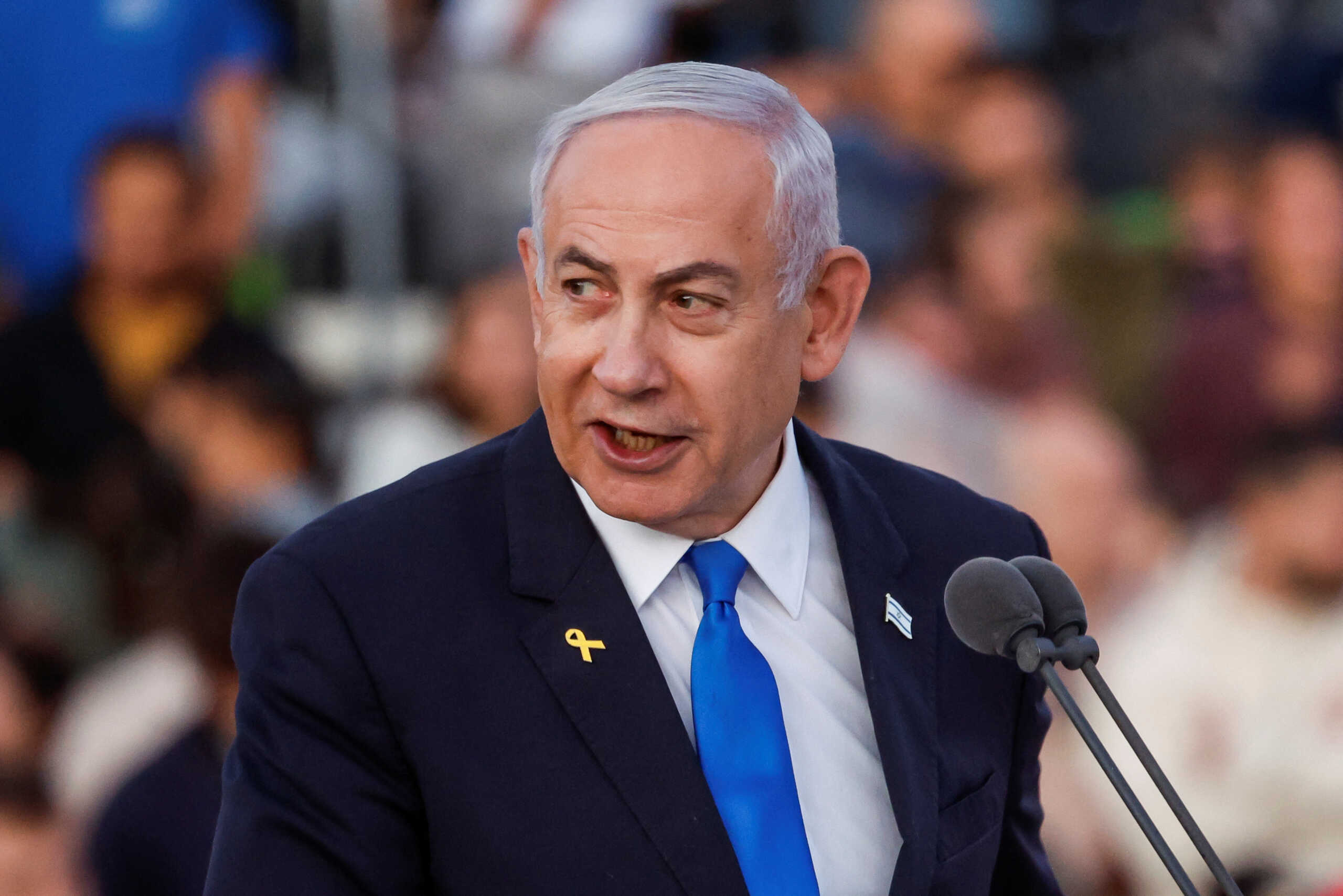 Israeli Prime Minister Benjamin Netanyahu speaks as he attends a ceremony for the 70th cohort of military combat officers, at an army base near Mitzpe Ramon, Israel, October 31, 2024. REUTERS