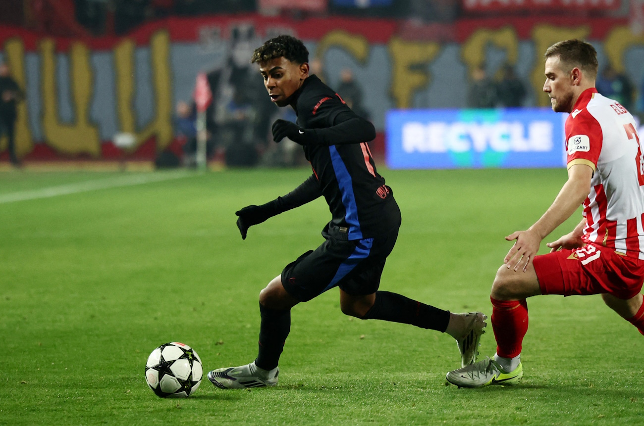 Soccer Football - Champions League - Crvena Zvezda v FC Barcelona - Rajko Mitic Stadium, Belgrade, Serbia - November 6, 2024 FC Barcelona's Lamine Yamal in action with Crvena Zvezda's Timi Max Elsnik REUTERS