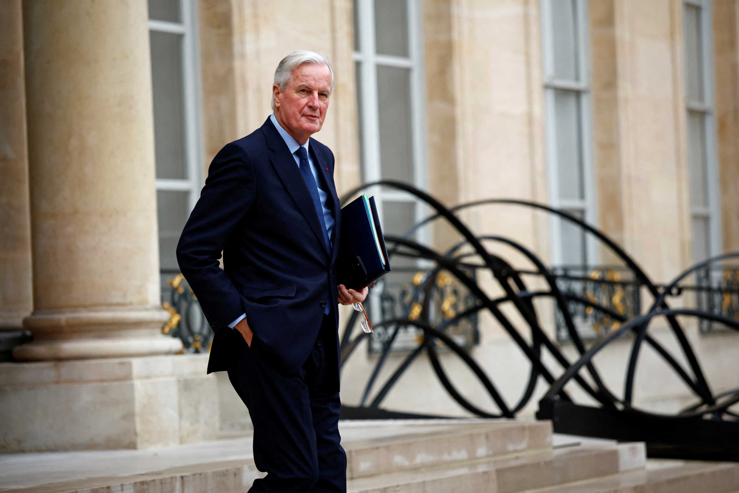 French Prime Minister Michel Barnier leaves following the weekly cabinet meeting at the Elysee Palace in Paris, France, November 27, 2024. REUTERS