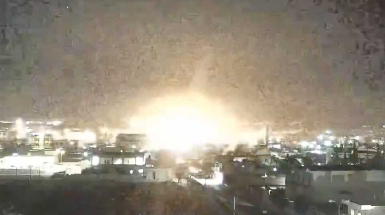 A view shows explosion among buildings in Tal Rifaat, Aleppo Governorate, Syria in this screen grab from a CCTV footage obtained from a social media video released on October 24, 2024. Social Media
