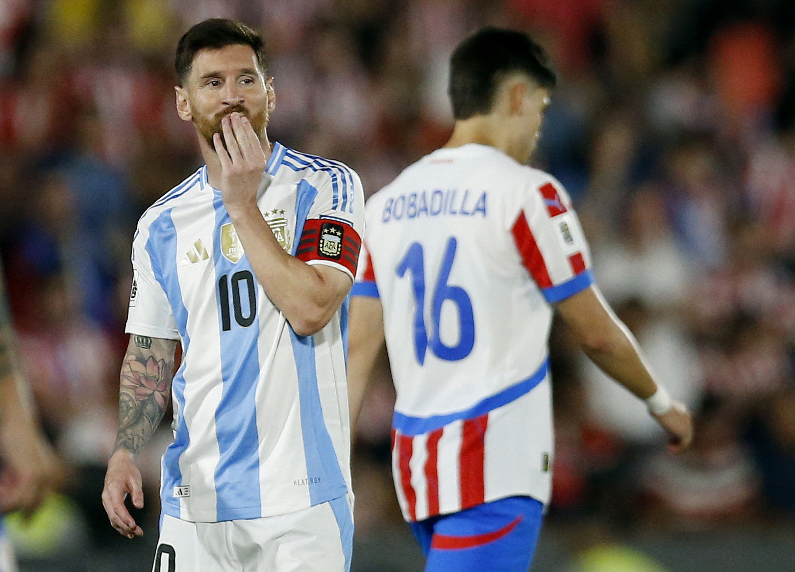 Soccer Football - World Cup - South American Qualifiers - Paraguay v Argentina - Estadio Defensores del Chaco, Asuncion, Paraguay - November 14, 2024 Argentina's Lionel Messi reacts REUTERS