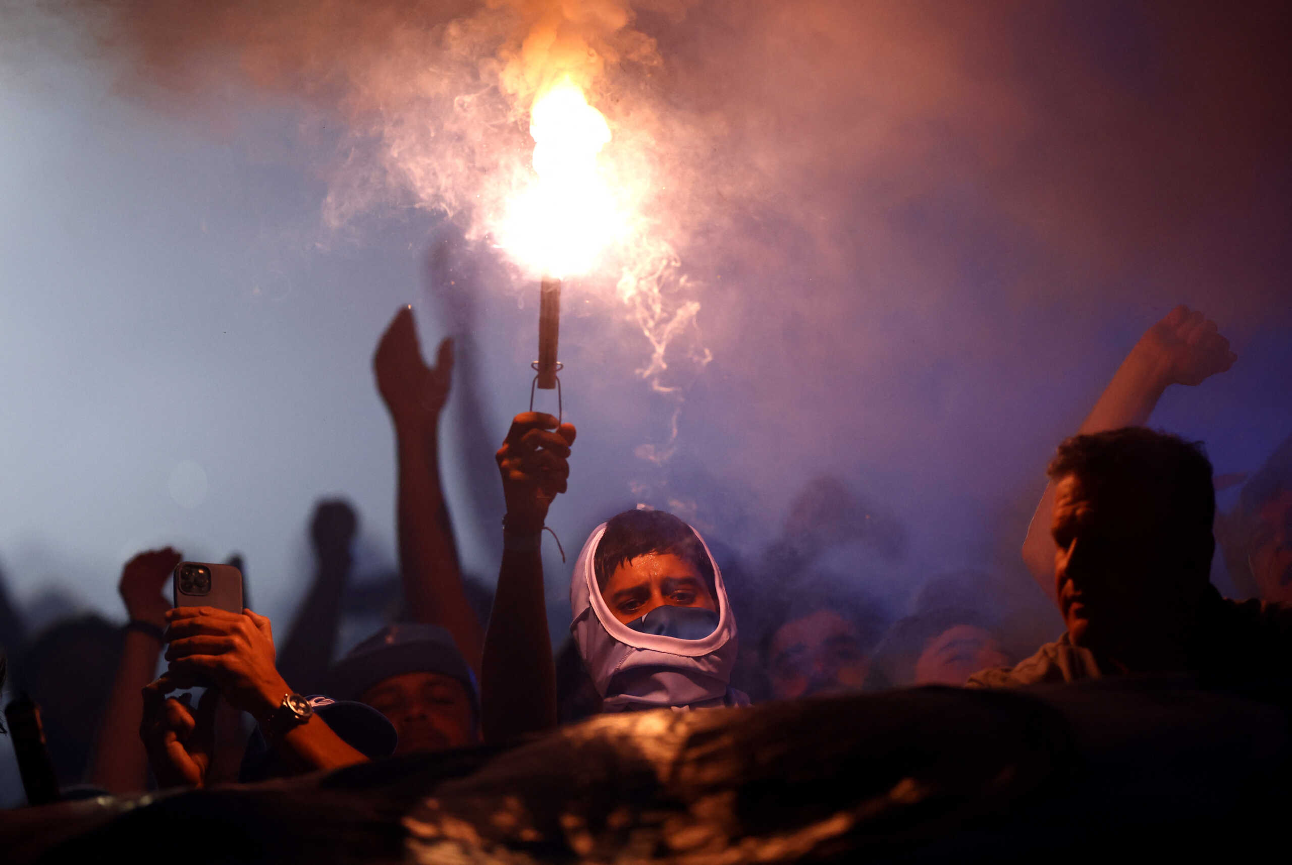 Soccer Football - Copa Sudamericana - Semi Final - Second Leg - Racing Club v Corinthians - Estadio Presidente Peron, Avellaneda, Argentina - October 31, 2024 Fans with flares in the stands before the match REUTERS