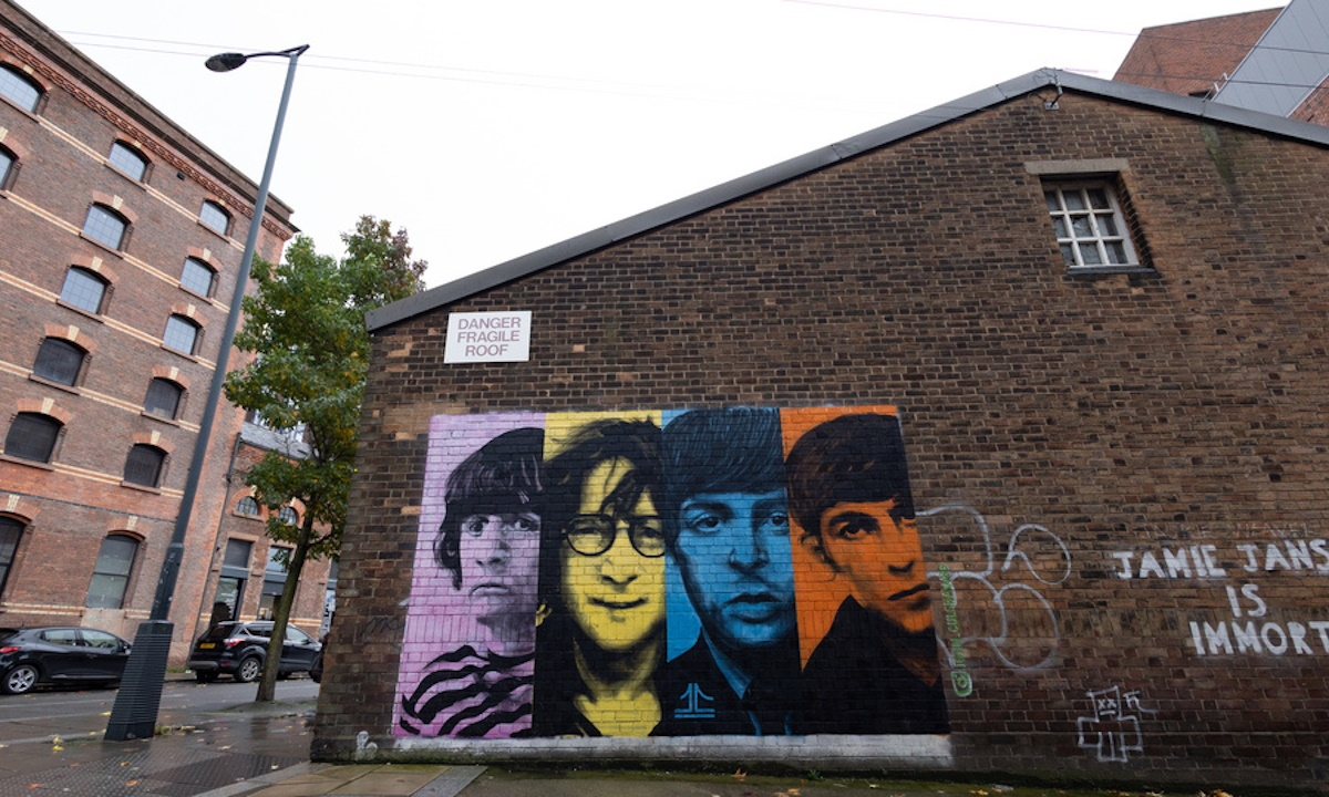 epa10954428 A mural of the Beatles in Liverpool, Britain, 02 November 2023. A final Beatles song featuring all four band members titled ‘Now and Then’ will be released on 02 November. The song has been created with the aid of artificial intelligence to separate John Lennon’s vocals from a demo tape he made in the 1970s, and features guitar parts recorded by George Harrison in 1995.  EPA