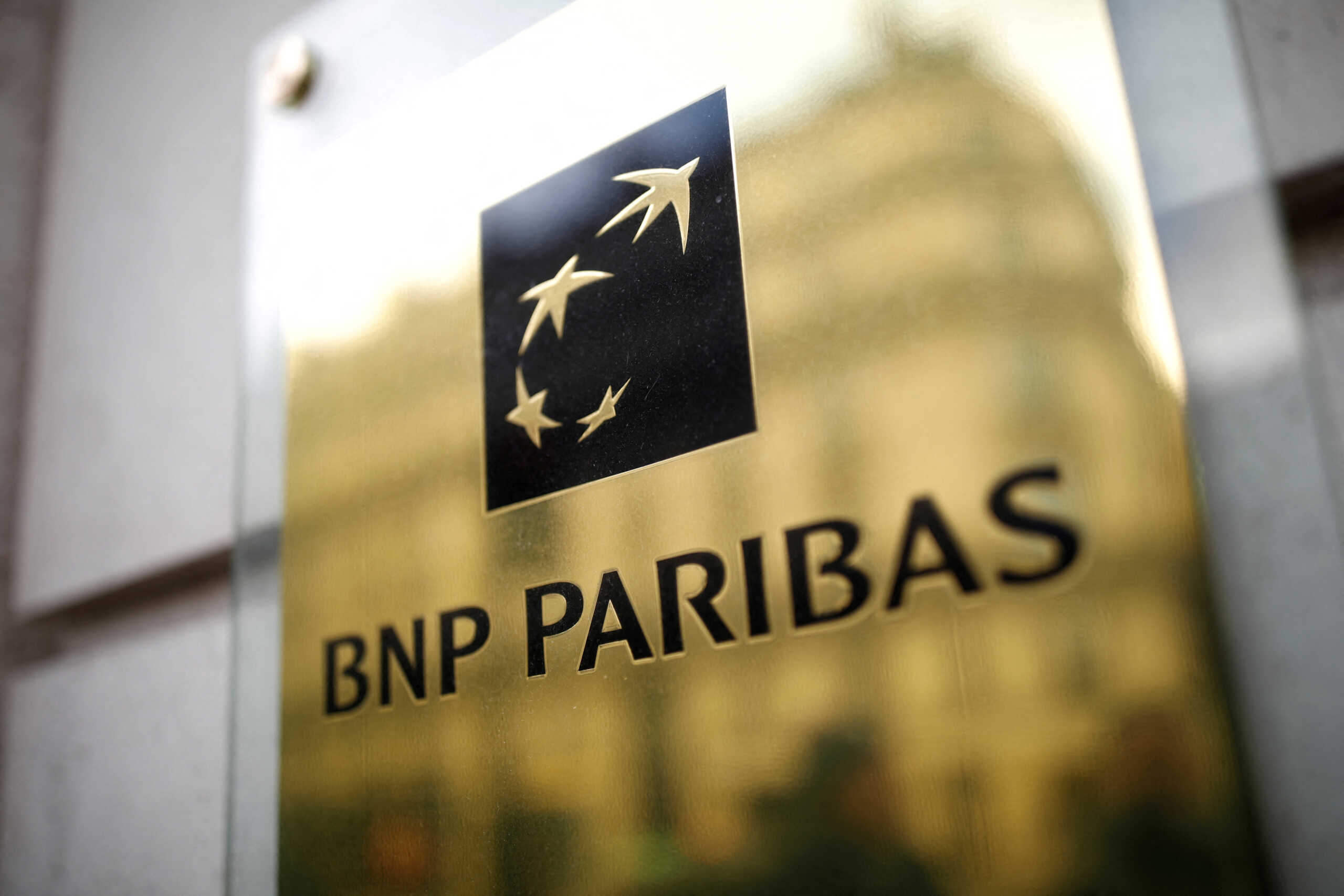 FILE PHOTO: The BNP Paribas logo is seen at a branch in Paris, France, February 4, 2020. REUTERS