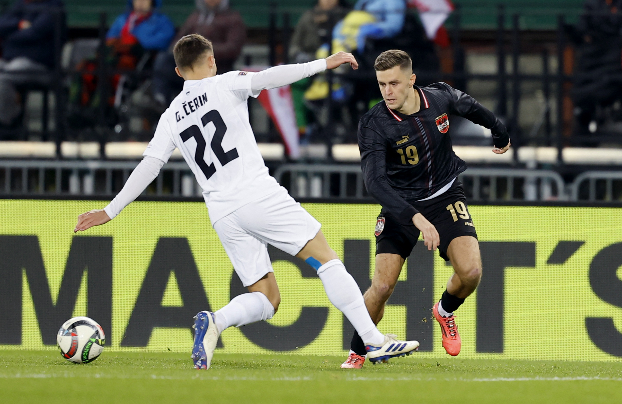 Soccer Football - Nations League - Group Stage - Austria v Slovenia - Ernst Happel Stadion, Vienna, Austria  - November 17, 2024 Austria's Christoph Baumgartner in action with Slovenia's Adam Gnezda Cerin REUTERS