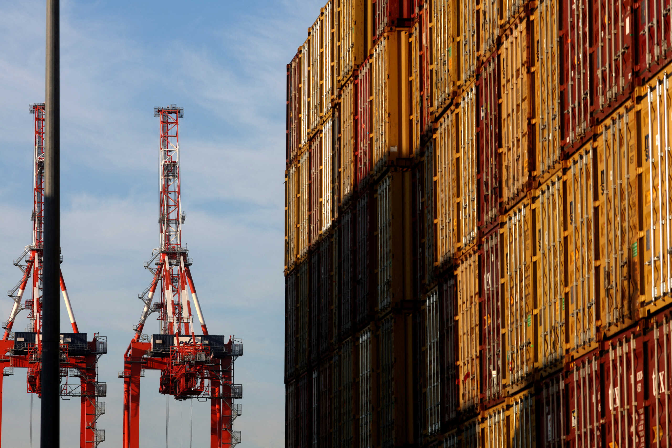 FILE PHOTO: Containers are stacked at Port Newark Container Terminal as U.S. East Coast and Gulf ports resumed operations Friday after unionised dockworkers reached a tentative labour agreement with an employer group for a new contract, ending a three-day strike in Newark, New Jersey, U.S., October 4, 2024. REUTERS