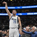 Nov 4, 2024; Dallas, Texas, USA; Dallas Mavericks guard Luka Doncic (77) poses after he makes a three point shot against the Indiana Pacers during the second half at the American Airlines Center. Mandatory Credit: Jerome Miron-Imagn Images
