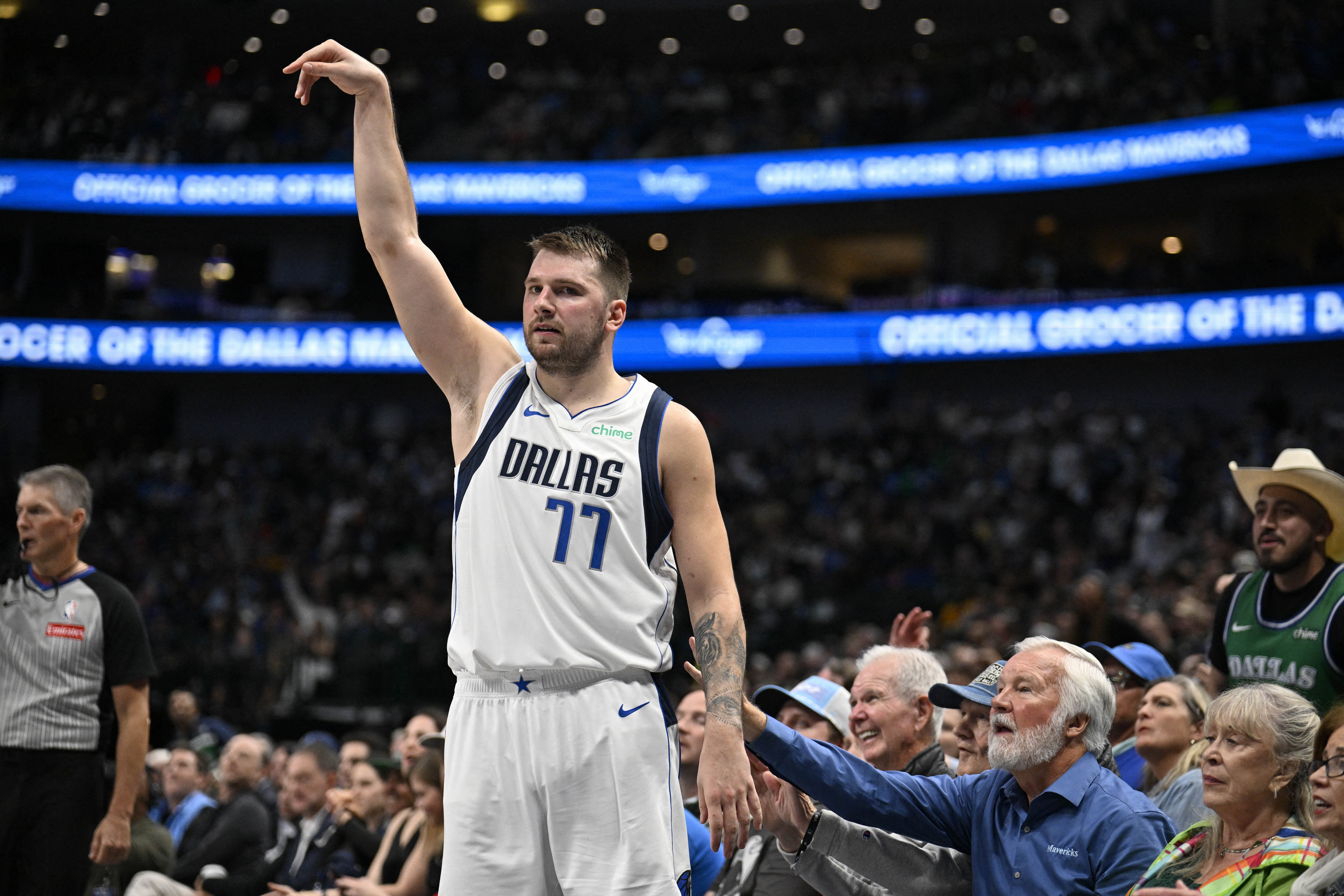 Nov 4, 2024; Dallas, Texas, USA; Dallas Mavericks guard Luka Doncic (77) poses after he makes a three point shot against the Indiana Pacers during the second half at the American Airlines Center. Mandatory Credit: Jerome Miron-Imagn Images