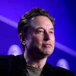 FILE PHOTO: Elon Musk, Chief Executive Officer of SpaceX and Tesla and owner of X looks on during the Milken Conference 2024 Global Conference Sessions at The Beverly Hilton in Beverly Hills, California, U.S., May 6, 2024.  REUTERS