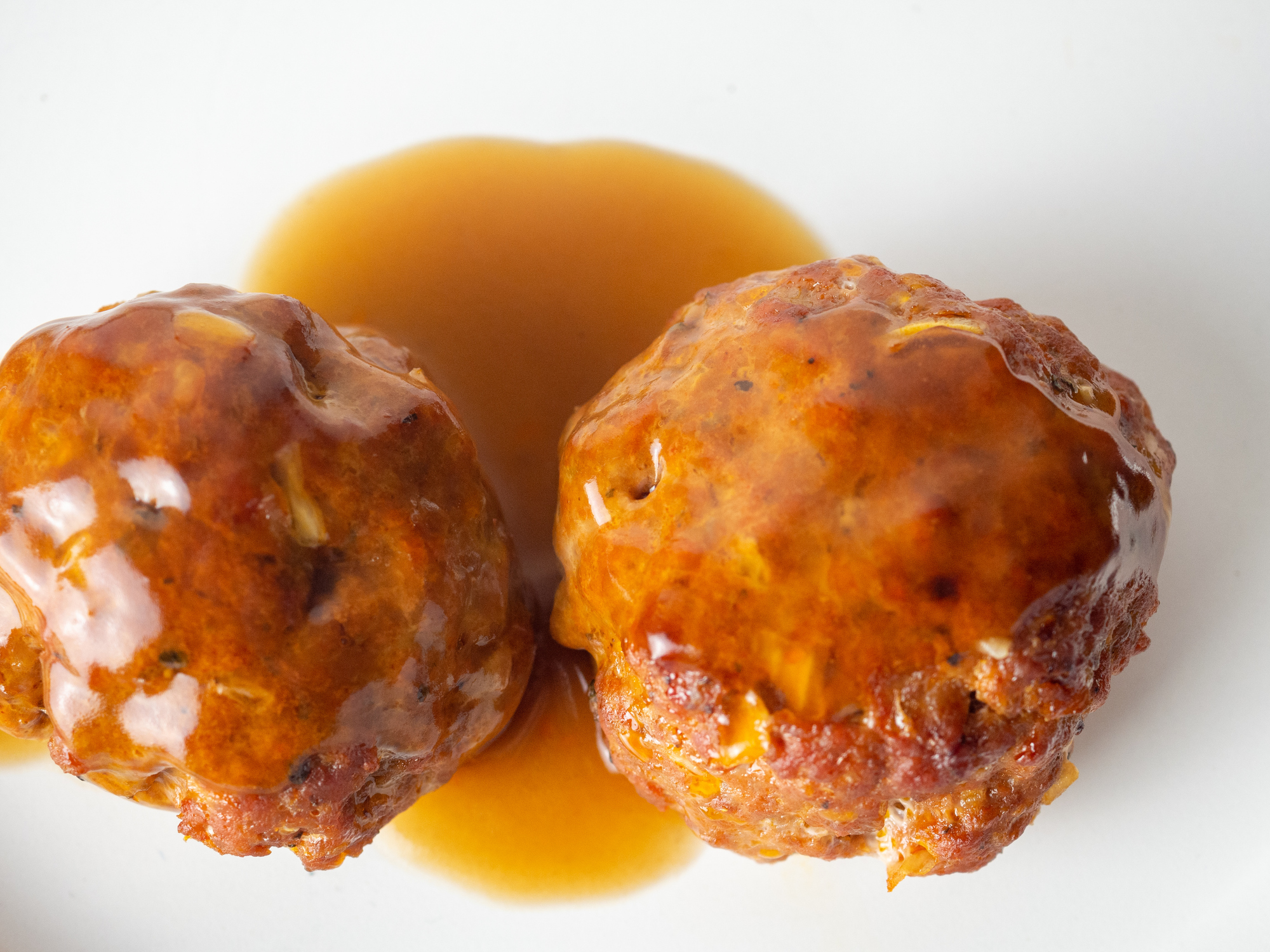 Faggot meatballs served with gravy and mashed potatoes - traditional British food