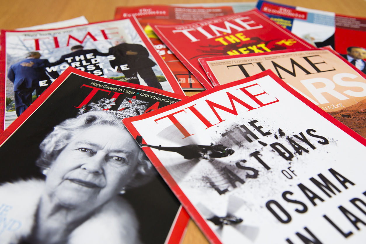 Shanghai, China - Oct 2, 2013: Popular Magazines in English language displayed, including Time and The Economist. Magazines are a great way to learn news, culture and short stories. They generate the majority of their income through advertising.
