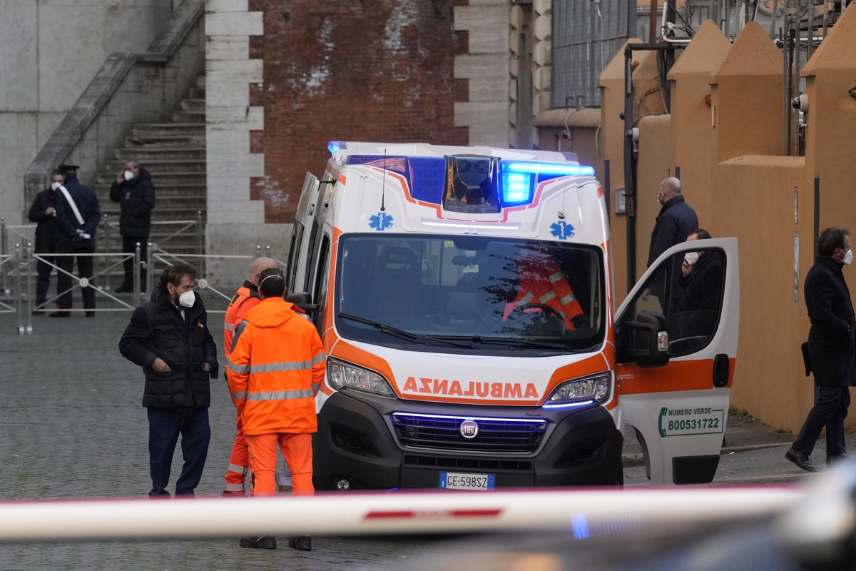 An ambulance is outside the entrance of a special drive-thru voting area set up outside Montecitorio parliament building for electors positive to COVID-19 or in quarantine, in Rome, Monday, Jan. 24, 2022. The first round of voting for Italy's next president opens Monday without a clear slate of candidates. Italy's lawmakers and a smaller group of special regional representatives are set to vote for a successor to Sergio Mattarella as Italy's head of state. (AP Photo