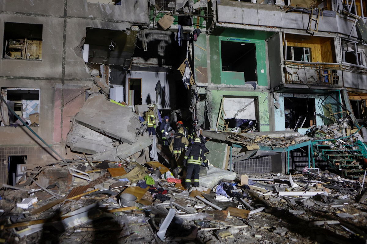 Rescuers work at a site of an apartment building hit by a Russian air strike, amid Russia's attack on Ukraine, in Kharkiv, Ukraine November 8, 2024. REUTERS