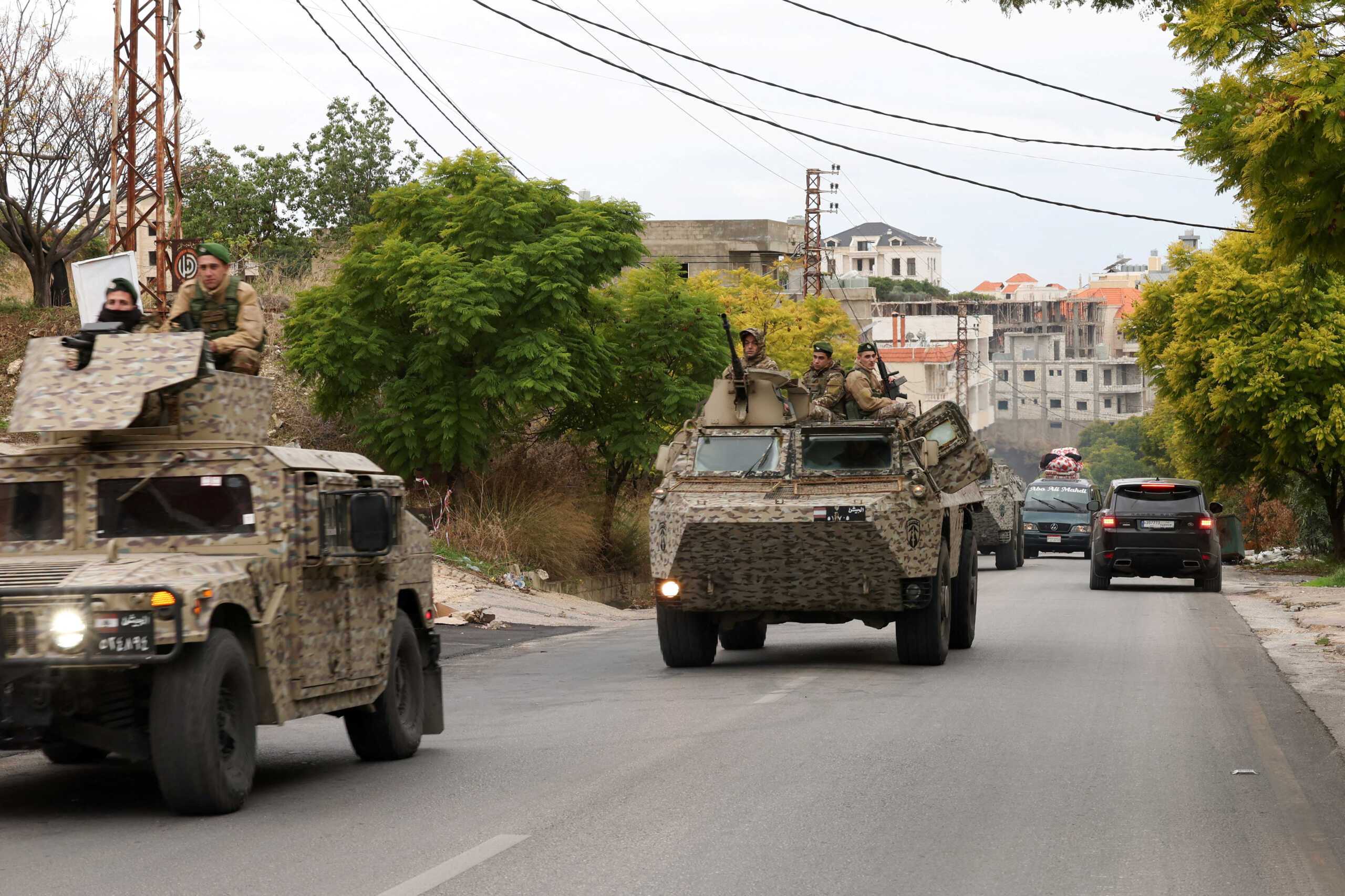 FILE PHOTO: Lebanese army soldiers drive in Qana after a ceasefire between Israel and Hezbollah took effect, southern Lebanon, November 27, 2024. REUTERS