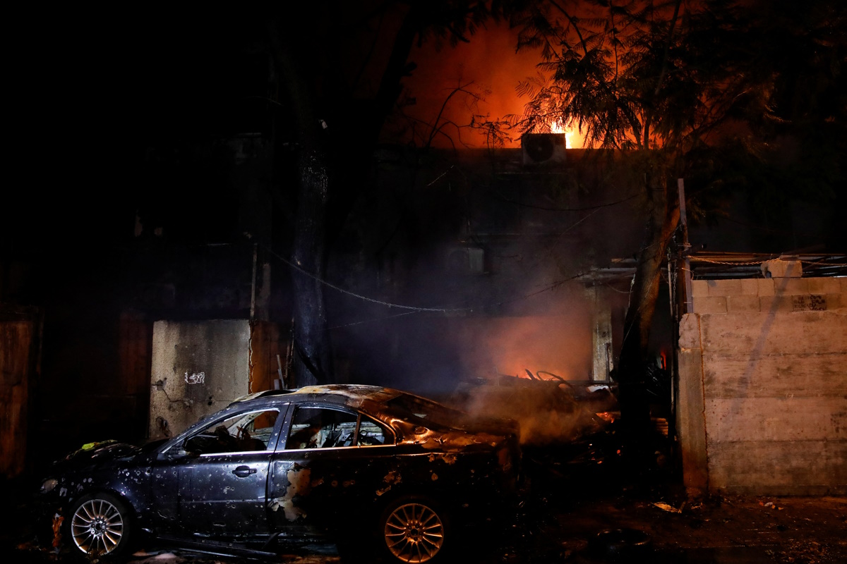 A view shows the scene where a projectile fell after projectiles were launched from Lebanon, amid ongoing hostilities between Hezbollah and Israel, in Kiryat Ata, northern Israel, November 11, 2024. REUTERS