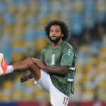 Marcelo of Brazil's Fluminense warms up prior to a Copa Libertadores Group A soccer match against Chile's Colo Colo at Maracana stadium in Rio de Janeiro, Brazil, Tuesday, April 9, 2024. (AP Photo