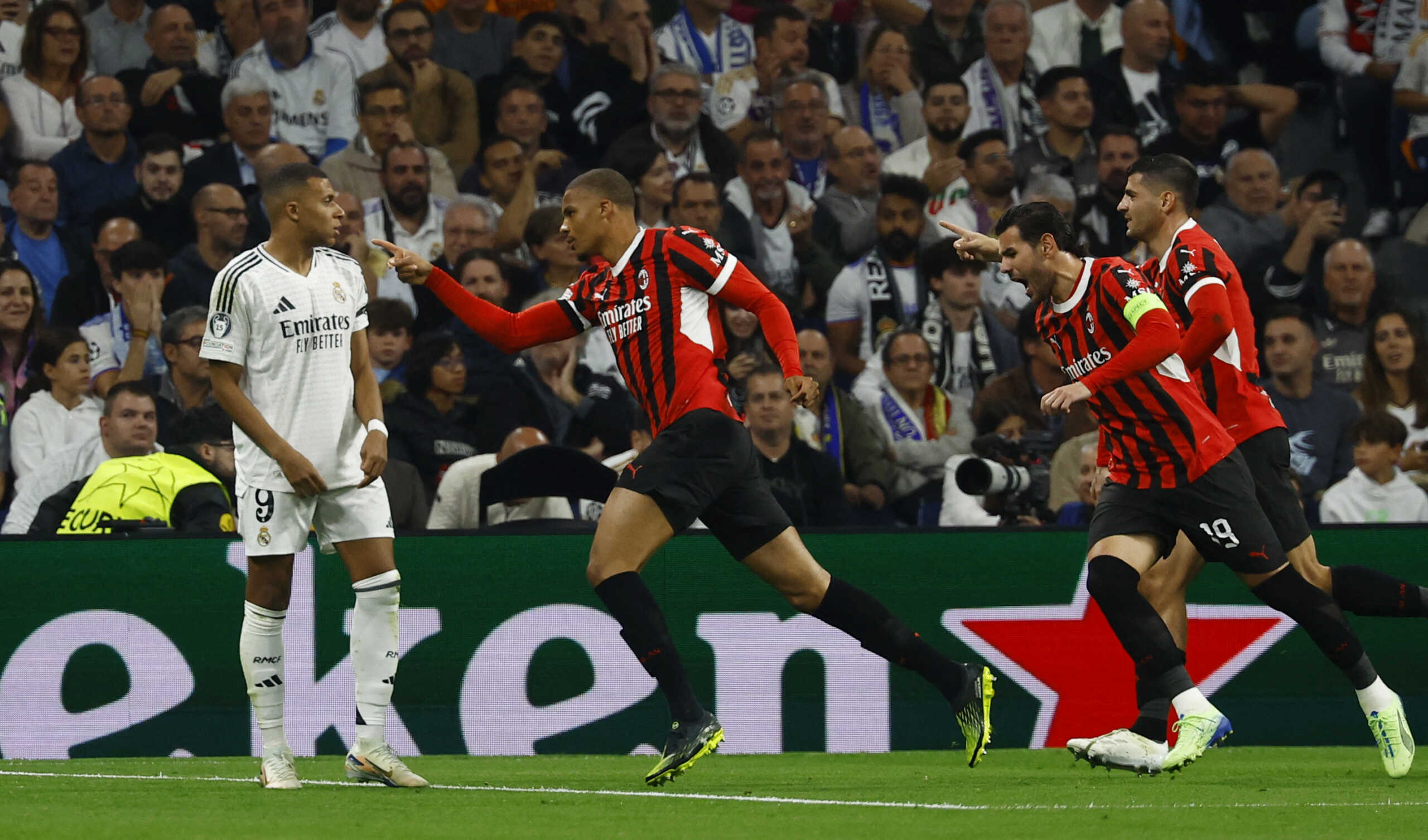 Soccer Football - Champions League - Real Madrid v AC Milan - Santiago Bernabeu, Madrid, Spain - November 5, 2024 AC Milan's Malick Thiaw celebrates scoring their first goal REUTERS
