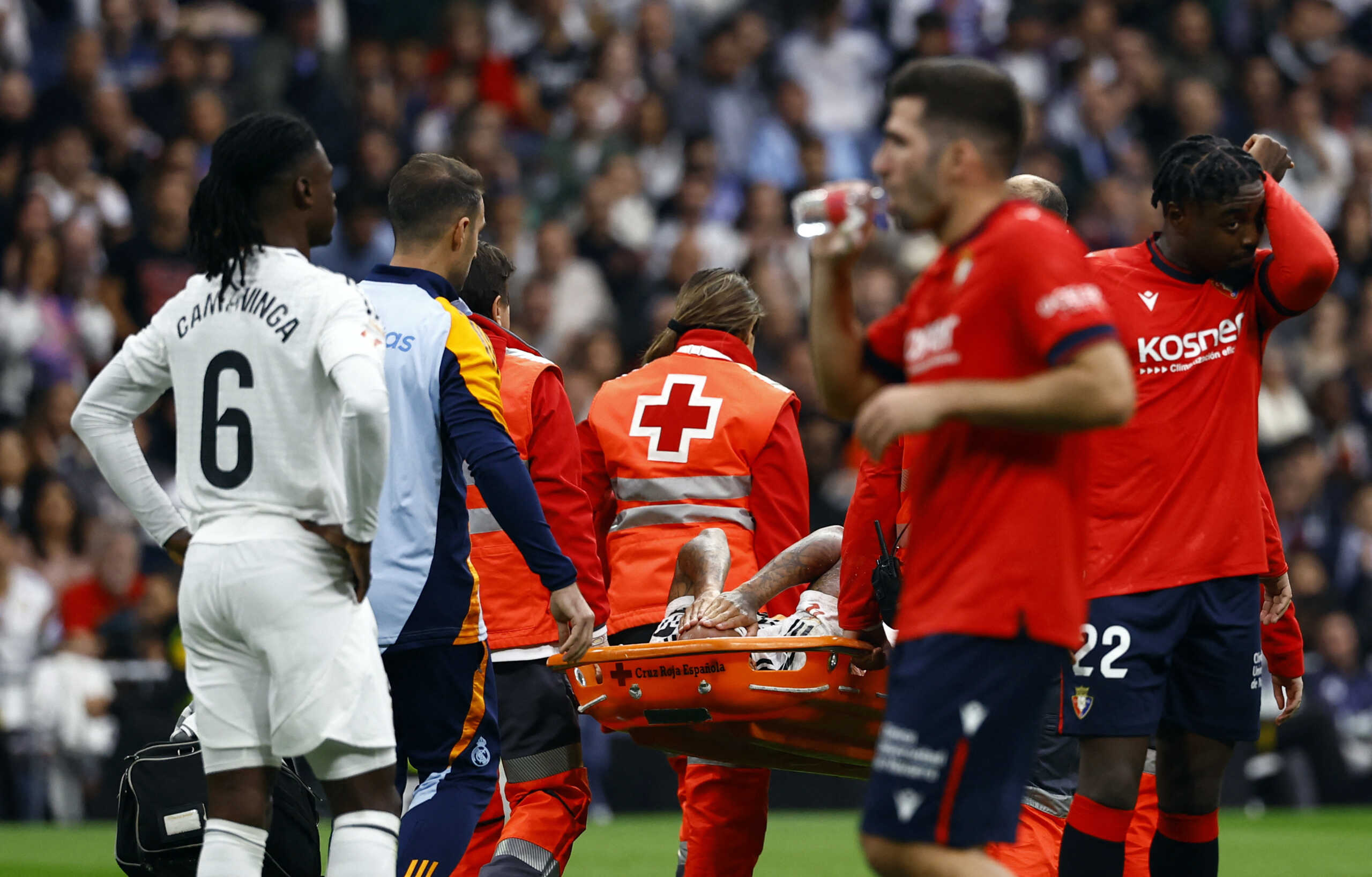 Soccer Football - LaLiga - Real Madrid v Osasuna - Santiago Bernabeu, Madrid, Spain - November 9, 2024 Real Madrid's Eder Militao is stretchered off after sustaining an injury REUTERS
