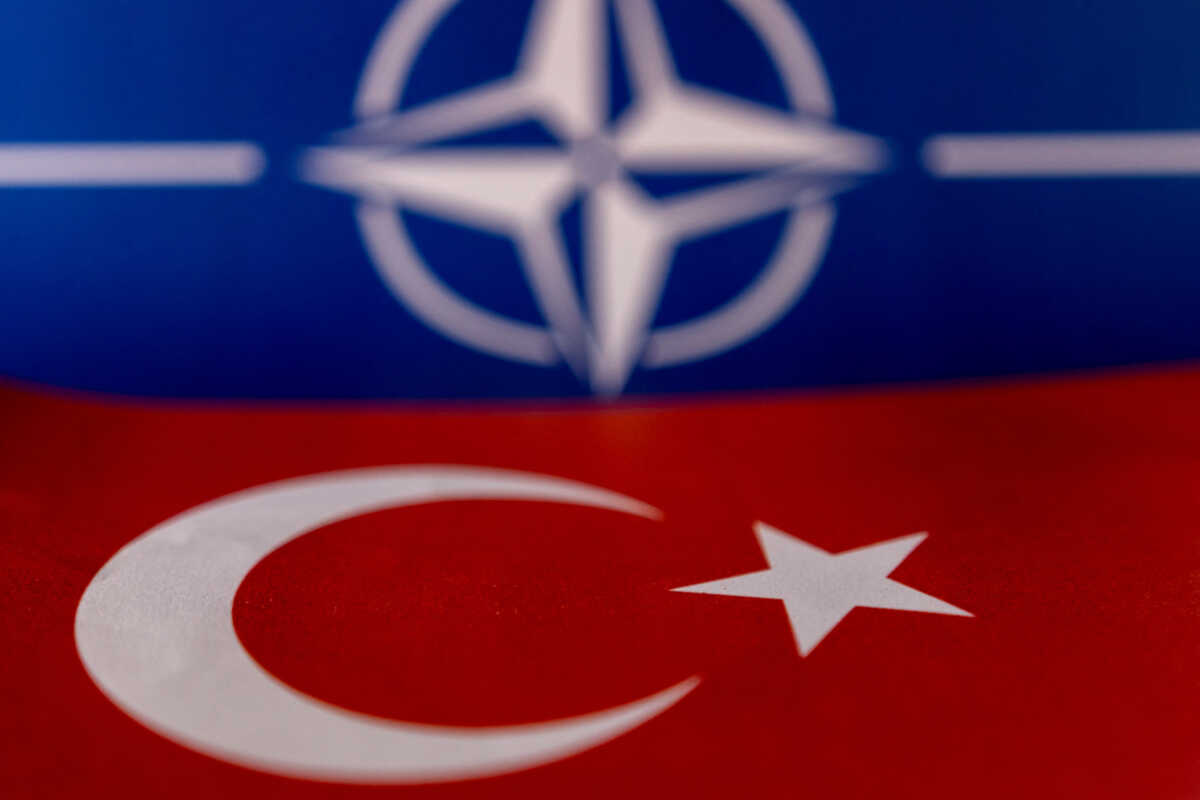 FILE PHOTO: NATO and Turkish flags are seen in this illustration taken May 18, 2022. REUTERS