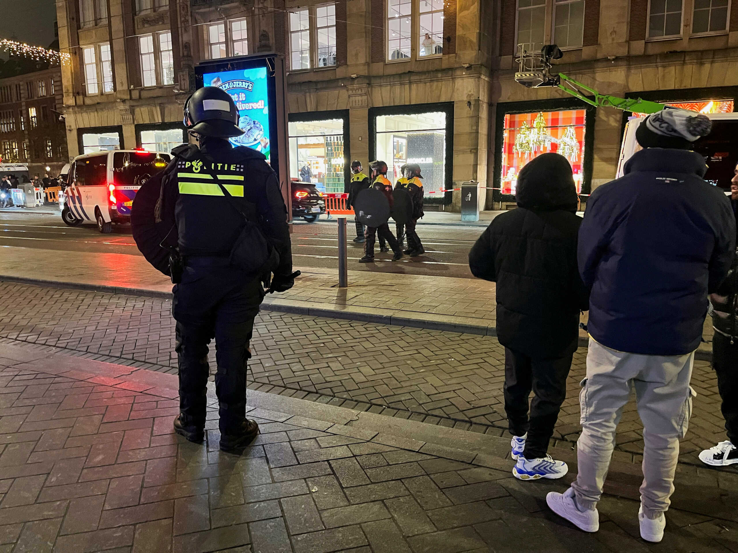 Israeli Maccabi Tel Aviv supporters are guarded by police after violence targeting Israeli football fans broke out in Amsterdam overnight, in Amsterdam, Netherlands, November 8, 2024, REUTERS