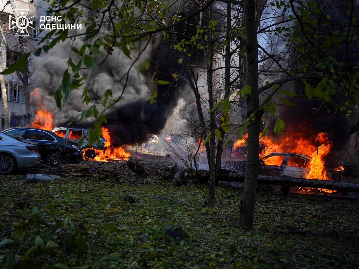 Cars burn at the site where a residential area was hit by a Russian missile strike, amid Russia's attack on Ukraine, in Odesa, Ukraine November 18, 2024. Press service of the State Emergency Service of Ukraine