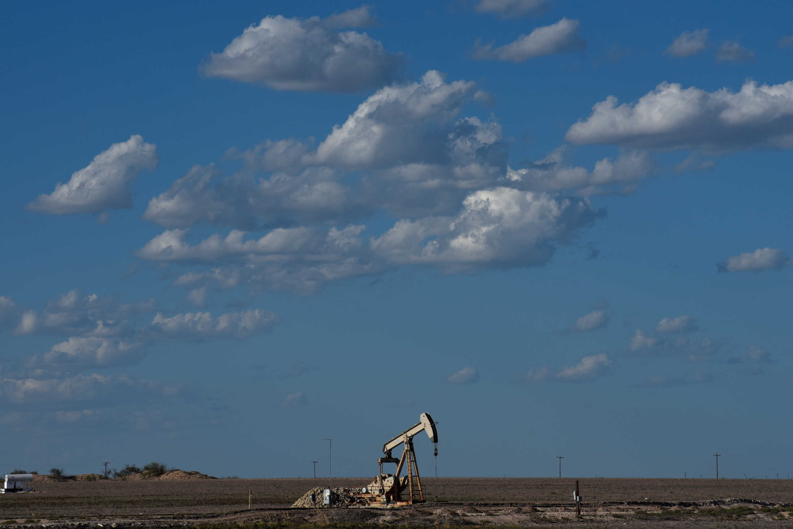 FILE PHOTO: A pump jack operates in the Permian Basin oil and natural gas production area near Midland, Texas U.S. August 23, 2018. Picture taken August 23, 2018. REUTERS