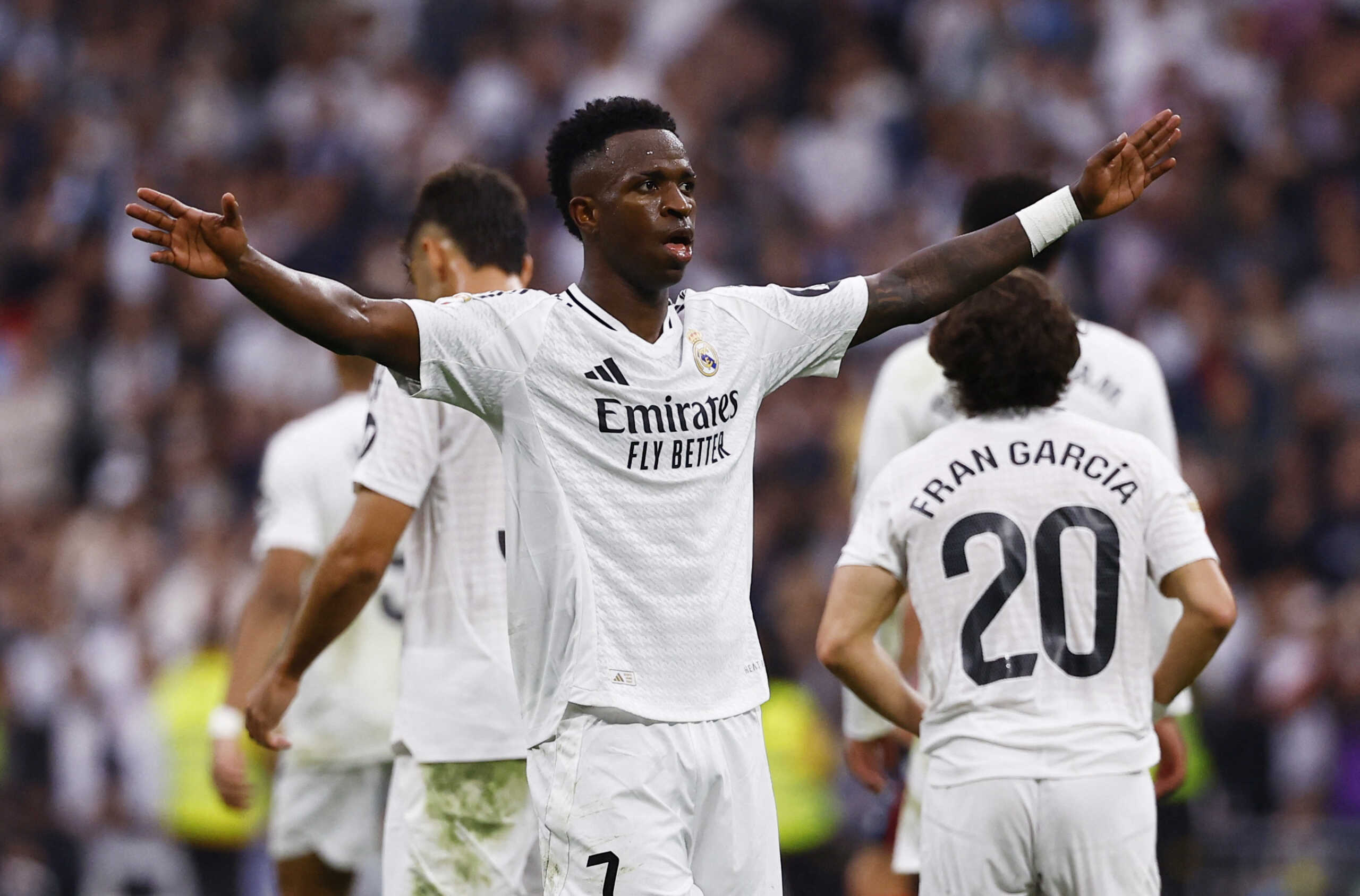 Soccer Football - LaLiga - Real Madrid v Osasuna - Santiago Bernabeu, Madrid, Spain - November 9, 2024 Real Madrid's Vinicius Junior celebrates scoring their fourth goal and completes his hat-trick REUTERS