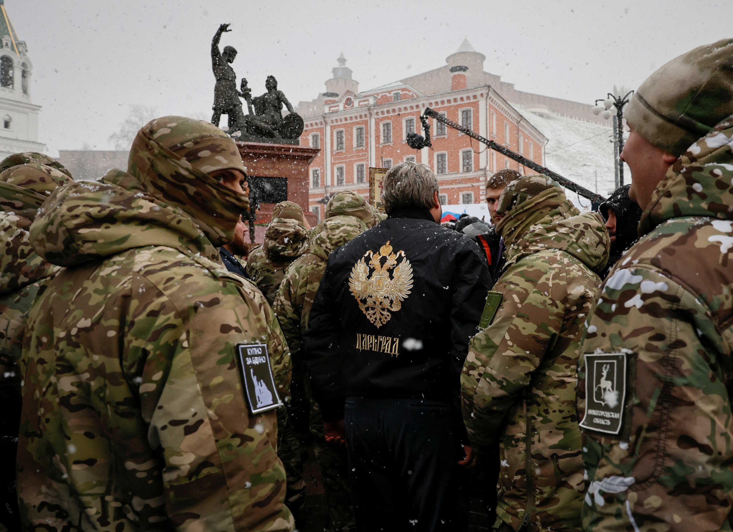 Volunteers, who joined the Russian armed forces involved in the country's military campaign in Ukraine, take part in a ceremony marking Russia's National Unity Day before their departure for garrison locations, in Nizhny Novgorod, Russia November 4, 2024. REUTERS