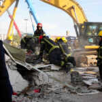 Rescue workers remove debris after a roof collapsed at the entrance to a railway station in Novi Sad, Serbia, November 1, 2024. Serbian Interior Ministry
