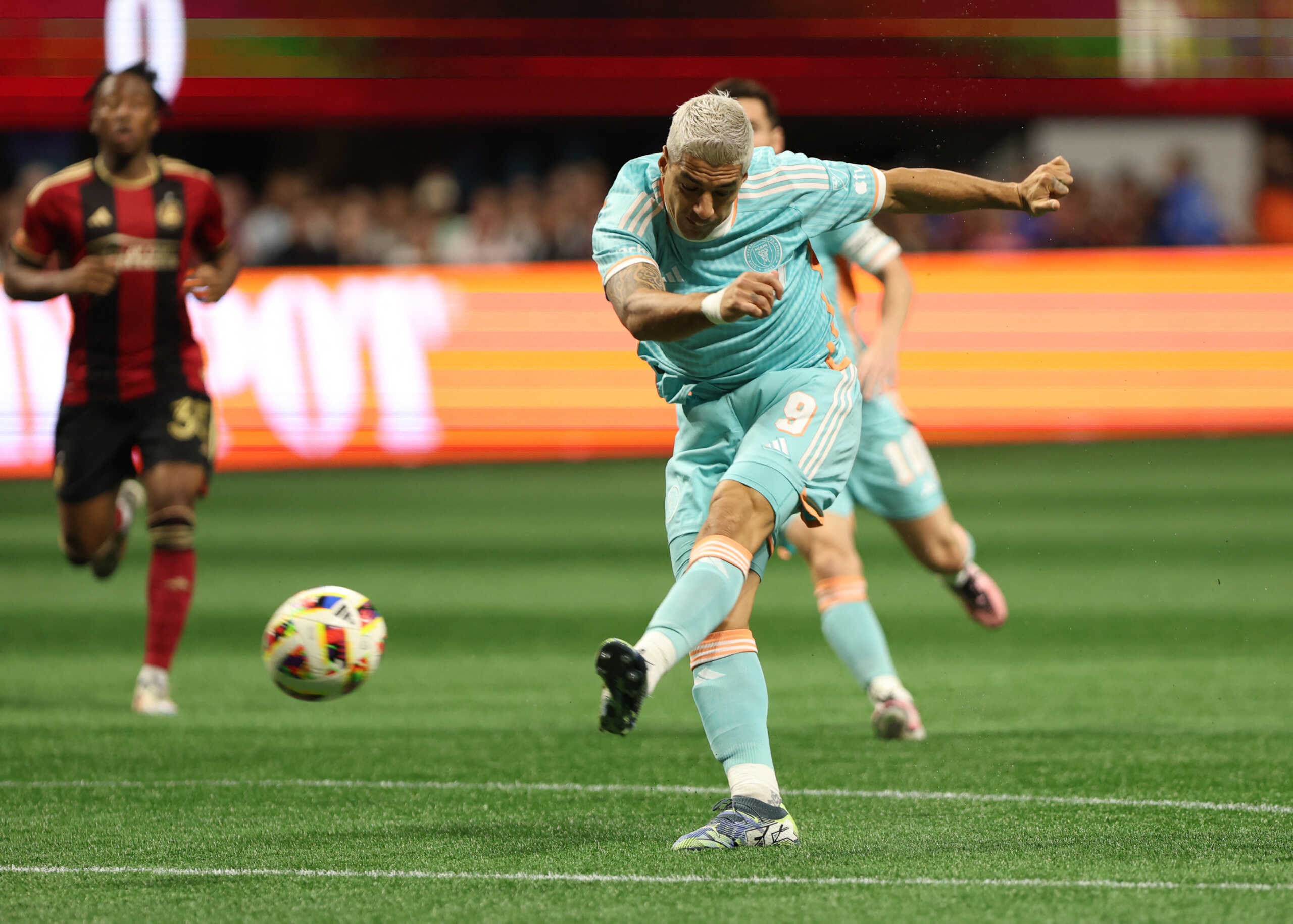 Nov 2, 2024; Atlanta, Georgia, USA; Inter Miami CF forward Luis Suarez (9) kicks a ball downfield during the first half against Atlanta United in a 2024 MLS Cup Playoffs Round One match at Mercedes-Benz Stadium. Mandatory Credit: Jordan Godfree-Imagn Images