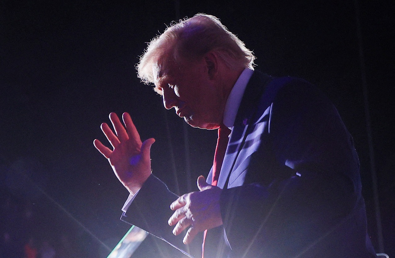 Republican presidential nominee and former U.S. President Donald Trump reacts during his campaign rally at Van Andel Arena in Grand Rapids, Michigan, U.S., November 5, 2024. REUTERS