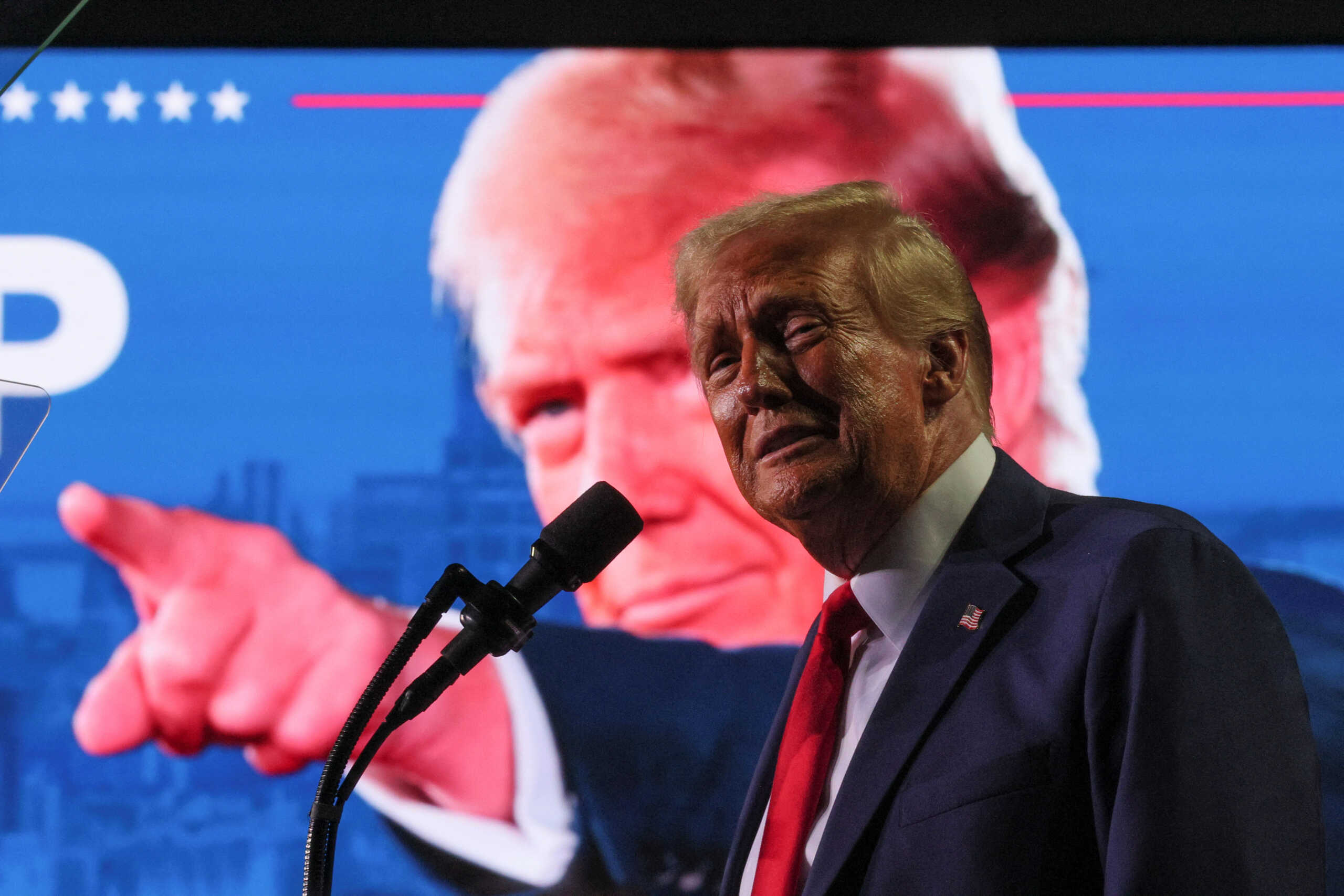 Republican presidential nominee and former U.S. President Donald Trump attends his campaign rally at Van Andel Arena in Grand Rapids, Michigan, U.S., November 5, 2024. REUTERS