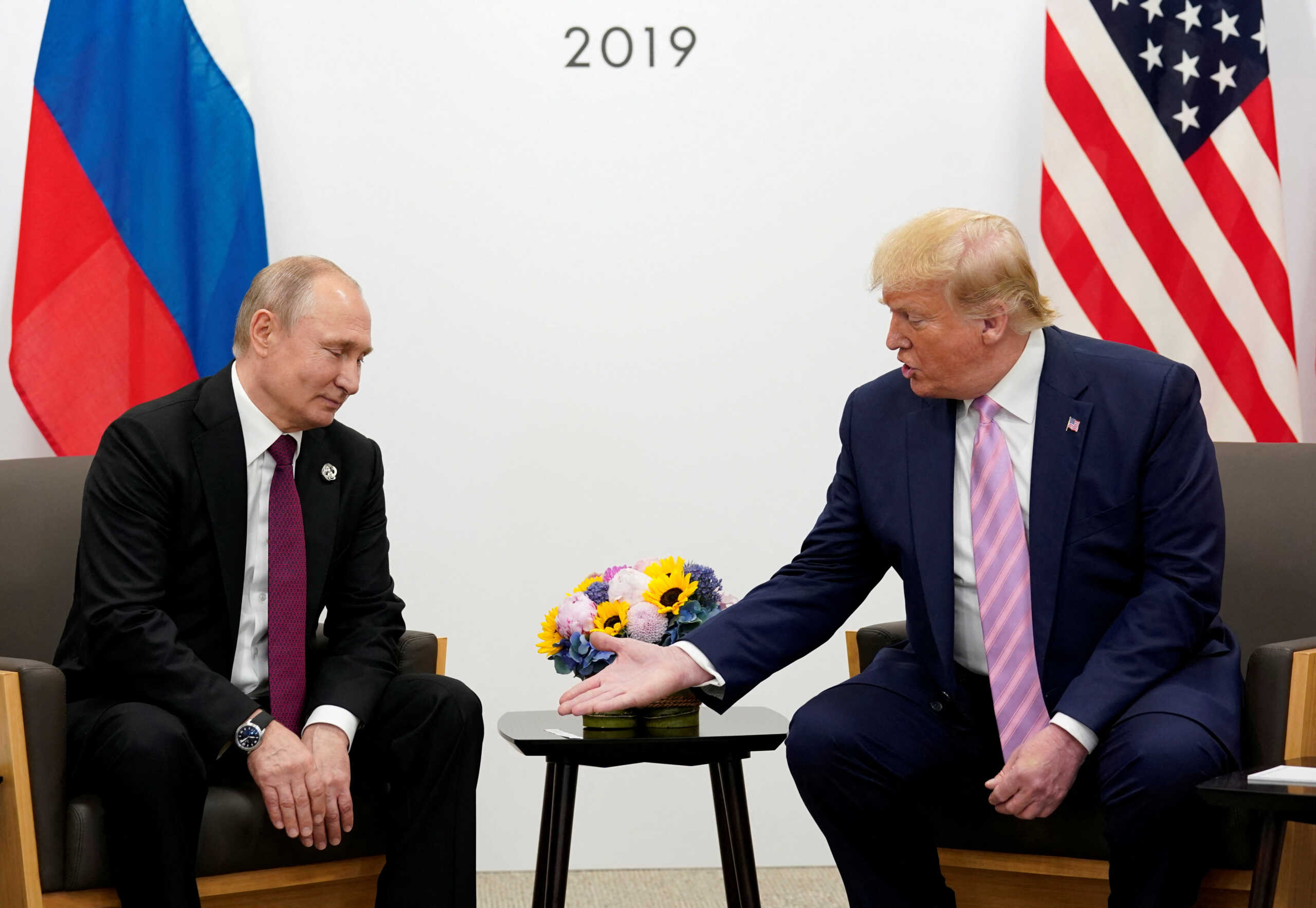 FILE PHOTO: U.S. President Donald Trump gestures during a bilateral meeting with Russia's President Vladimir Putin at the G20 leaders summit in Osaka, Japan, June 28, 2019.  REUTERS
