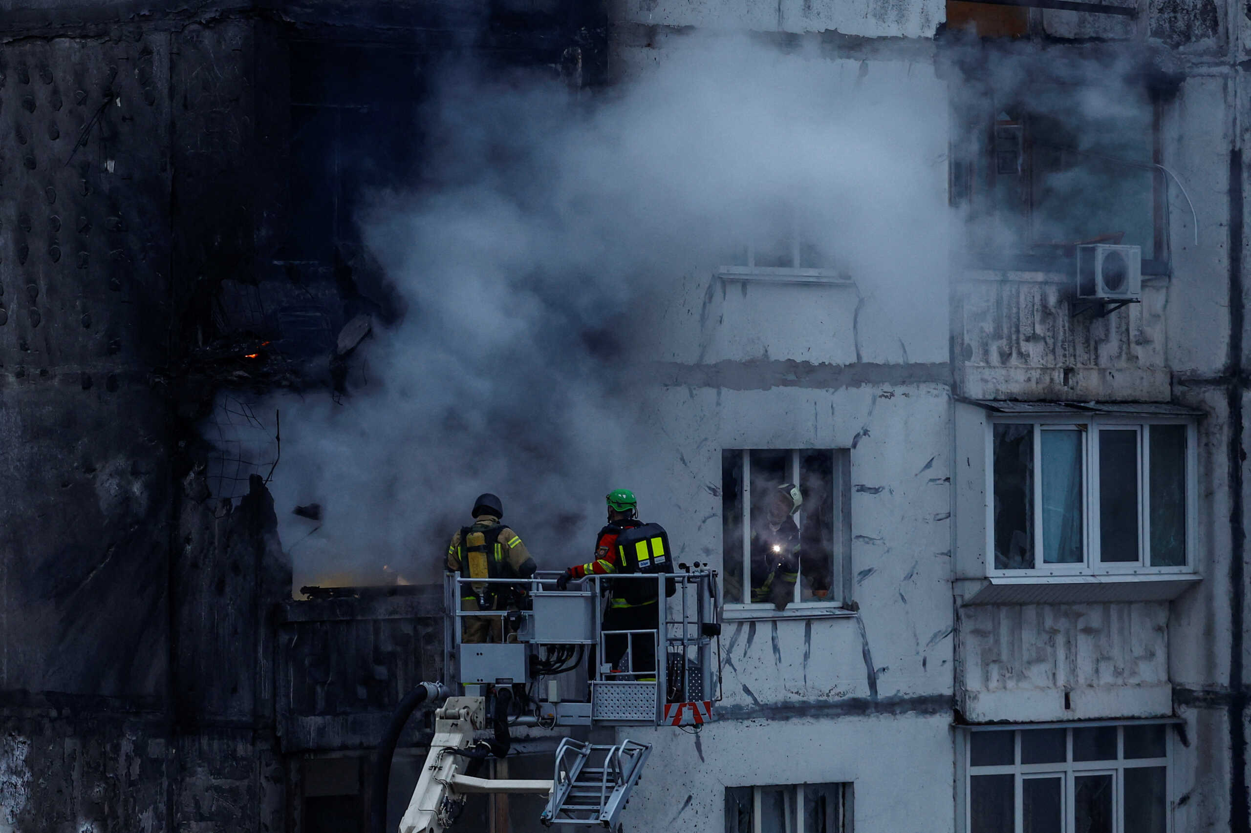 Firefighters work at a site of an apartment building damaged by a Russian drone strike, amid Russia's attack on Ukraine, in Kyiv, Ukraine November 2, 2024. REUTERS