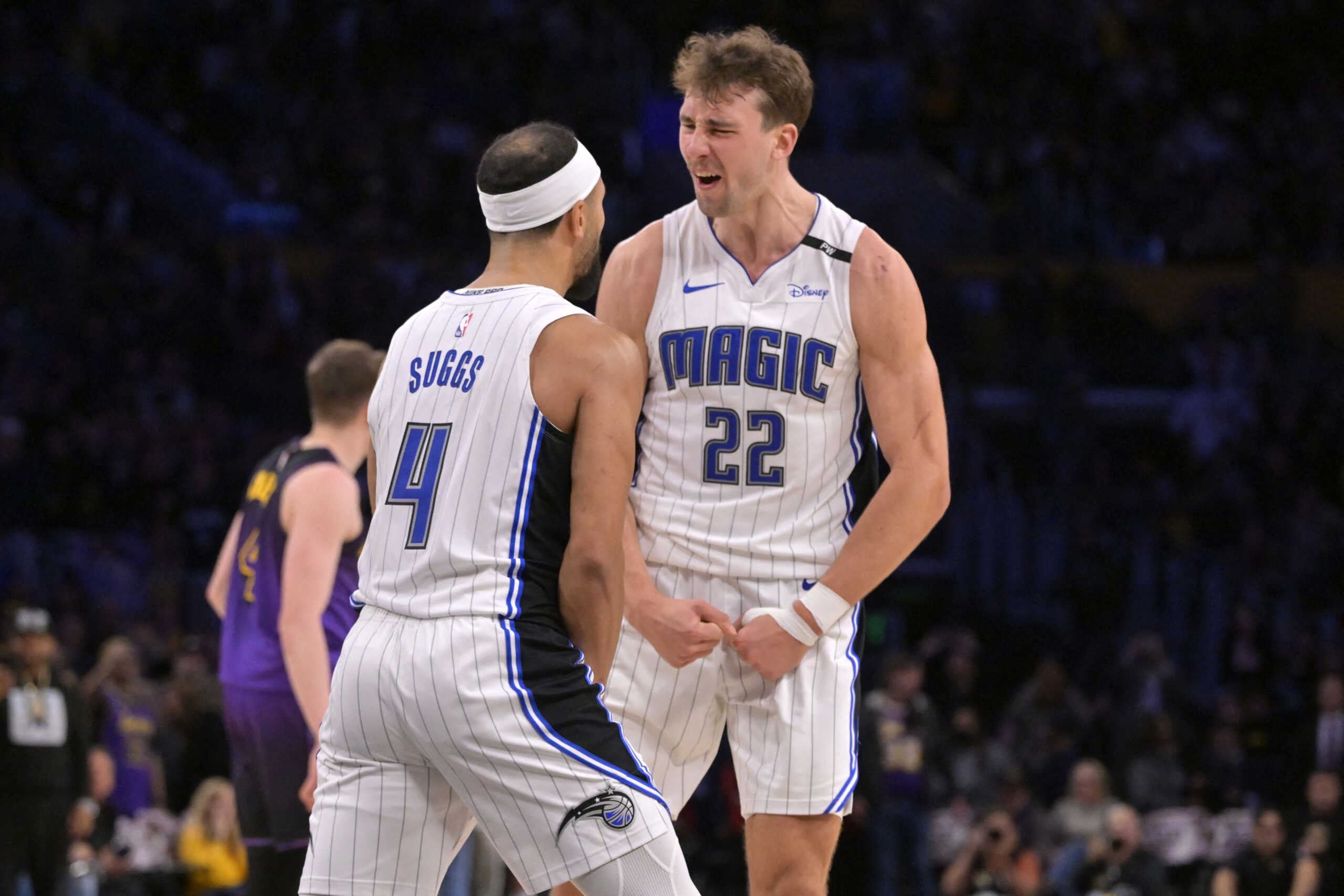 Nov 21, 2024; Los Angeles, California, USA; Orlando Magic forward Franz Wagner (22) celebrates with guard Jalen Suggs (4) after defeating the Los Angeles Lakers with a 3-point basket with 2.5 seconds left in the game at Crypto.com Arena. Mandatory Credit: Jayne Kamin-Oncea-Imagn Images