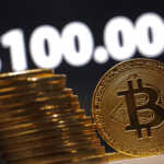 Representations of cryptocurrency Bitcoin and words "$100.000" are seen in this illustration taken November 24, 2024. REUTERS