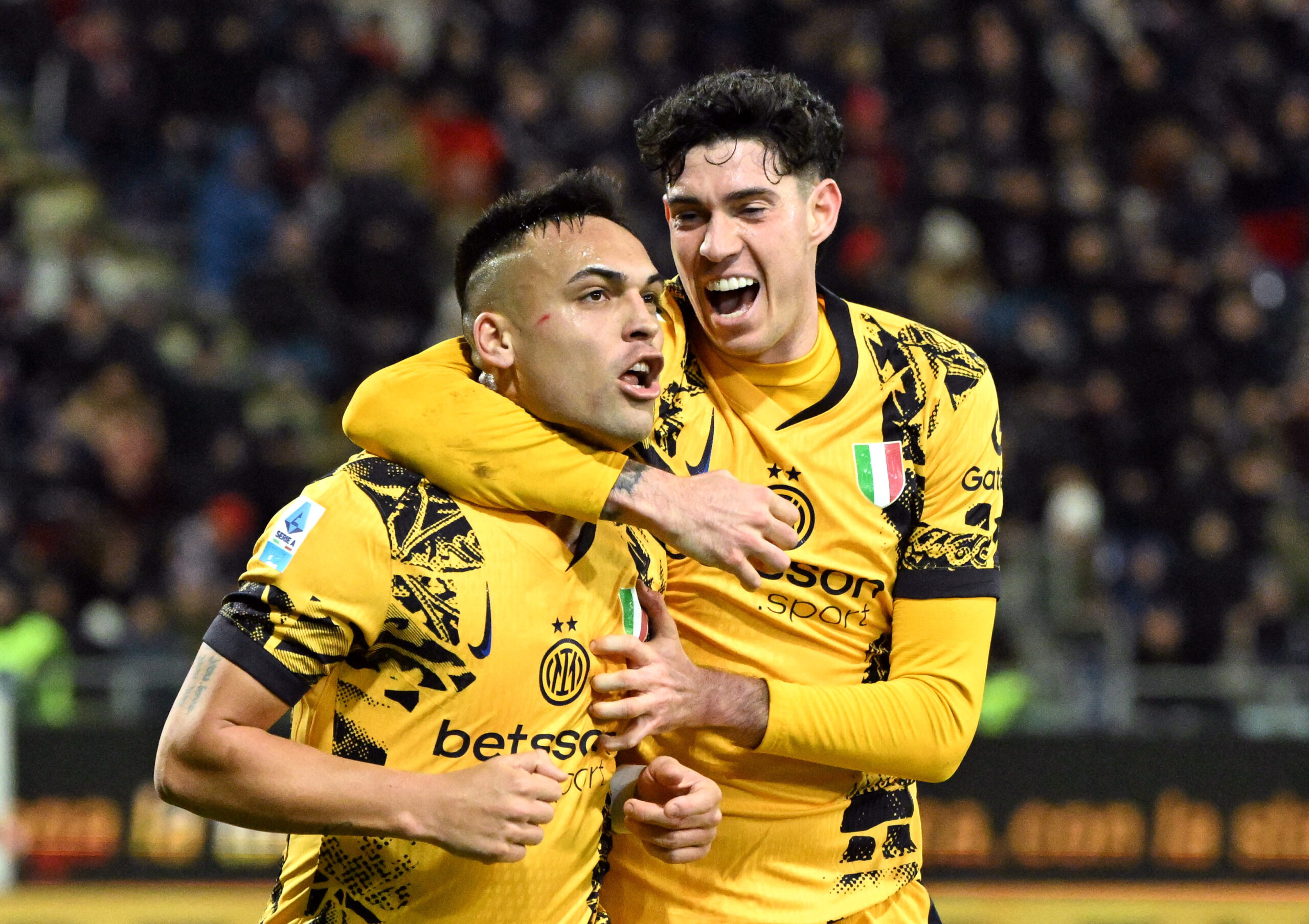 Soccer Football - Serie A - Cagliari v Inter Milan - Unipol Domus, Cagliari, Italy - December 28, 2024 Inter Milan's Lautaro Martinez celebrates scoring their second goal with Alessandro Bastoni REUTERS