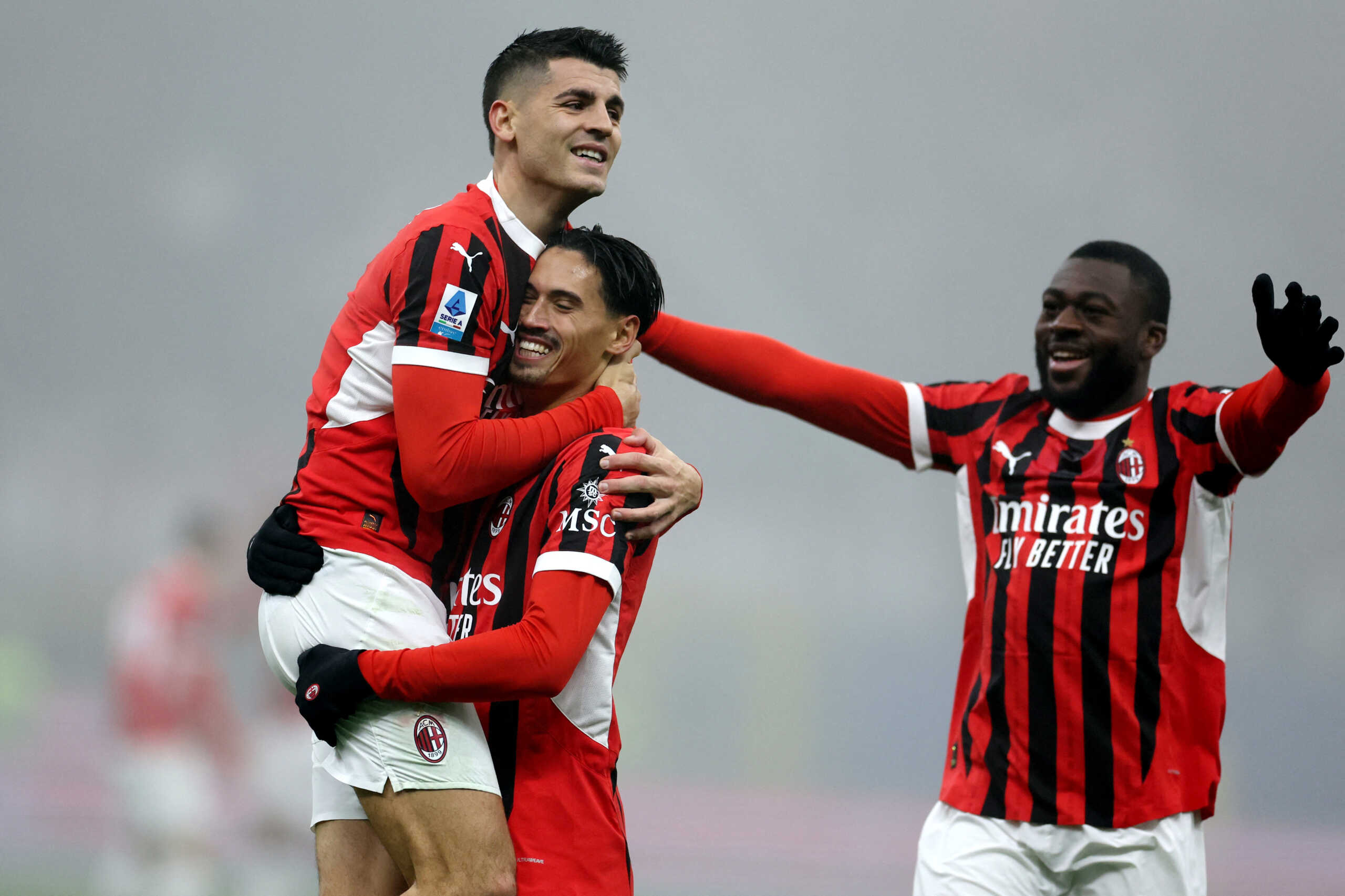 Soccer Football - Serie A - AC Milan v Empoli - San Siro, Milan, Italy - November 30, 2024 AC Milan's Tijjani Reijnders celebrates scoring their third goal with Alvaro Morata REUTERS