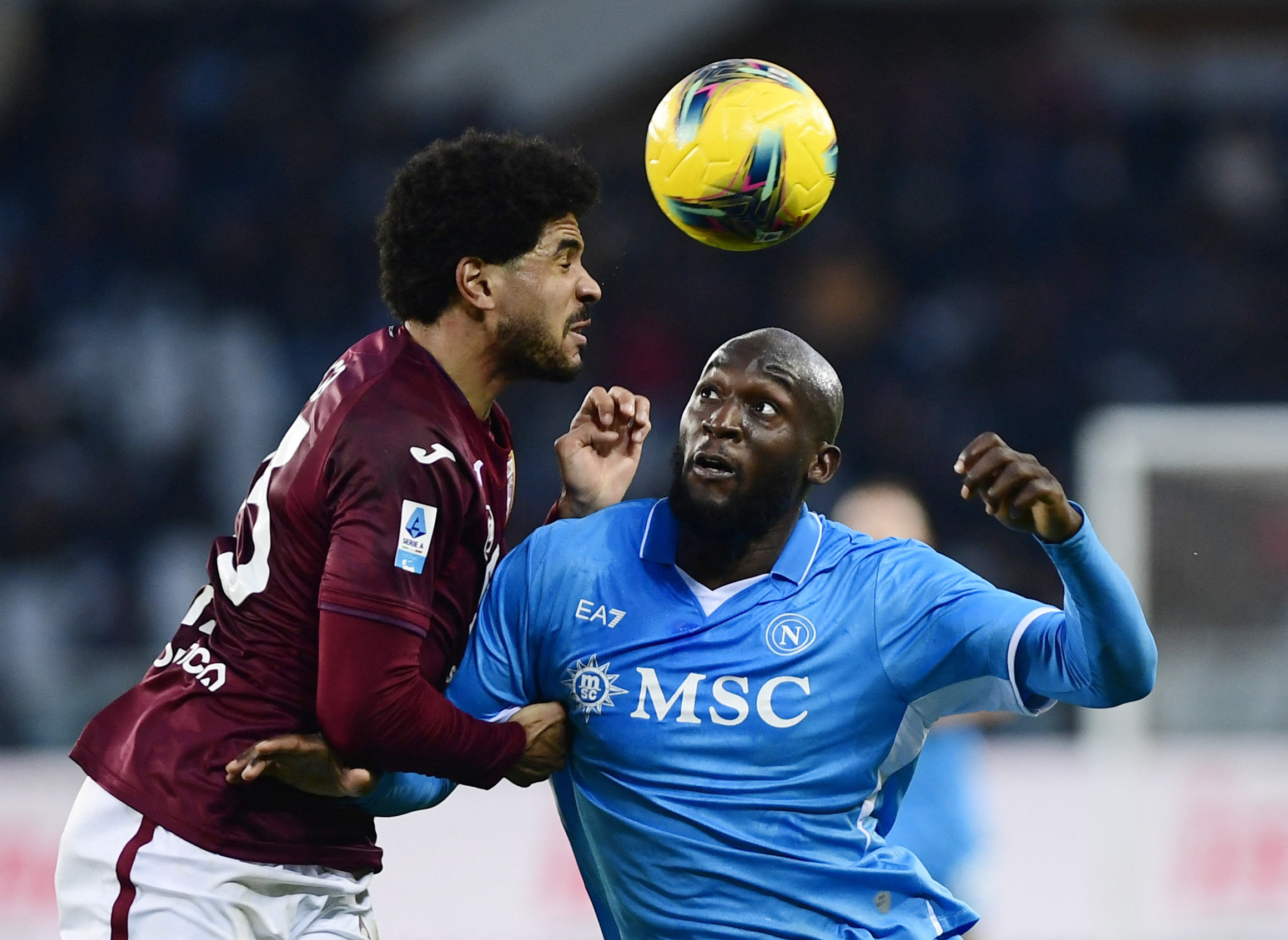 Soccer Football - Serie A - Torino v Napoli - Stadio Olimpico Grande Torino, Turin, Italy - December 1, 2024 Napoli's Romelu Lukaku in action with Torino's Saul Coco REUTERS
