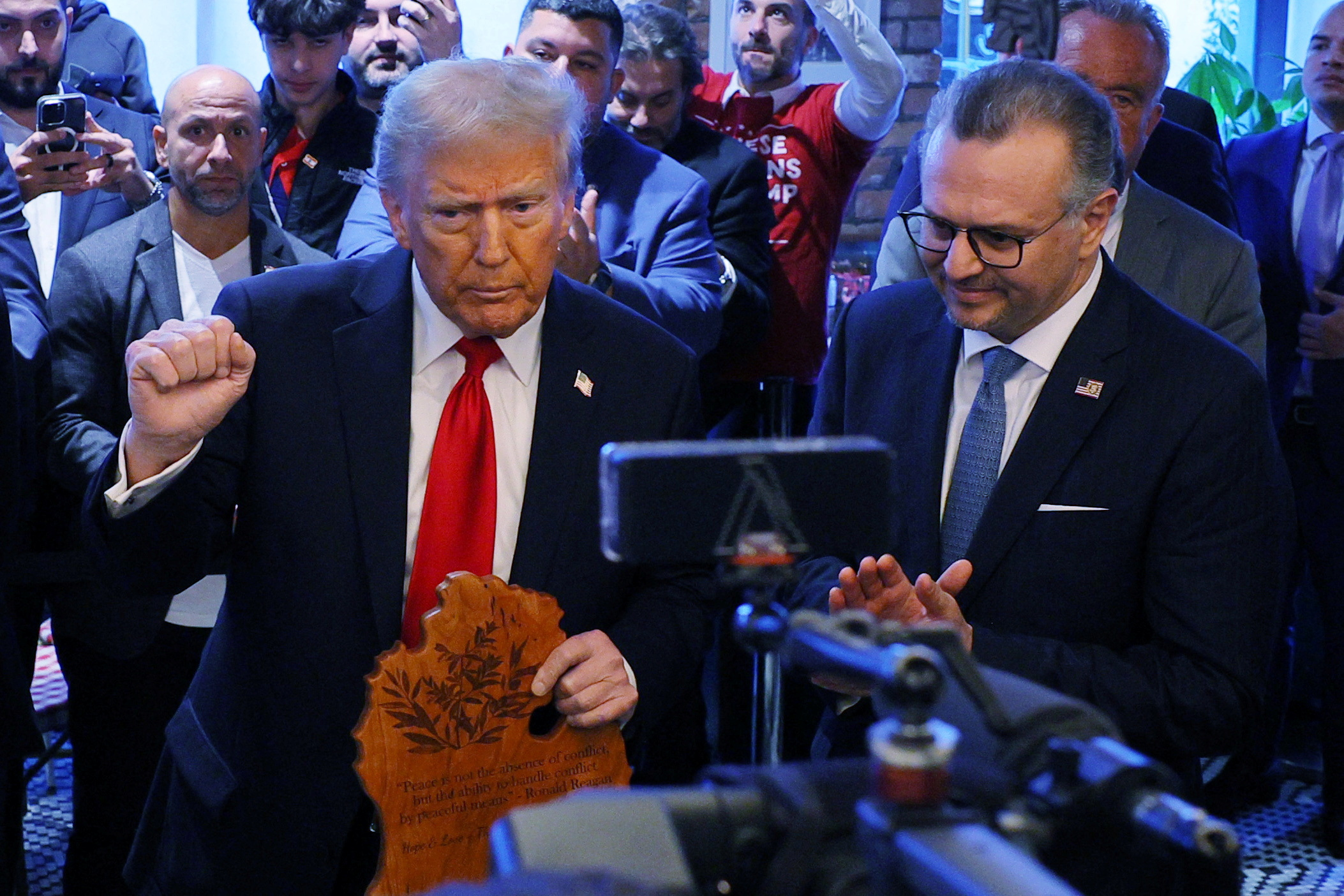 FILE PHOTO: Republican presidential nominee and former U.S. President Donald Trump is joined by Massad Boulos, who was recently named as a 'senior advisor to the President on Arab and Middle Eastern Affairs,' during a campaign stop at the Great Commoner restaurant in Dearborn, Michigan, U.S., on November 1, 2024. REUTERS