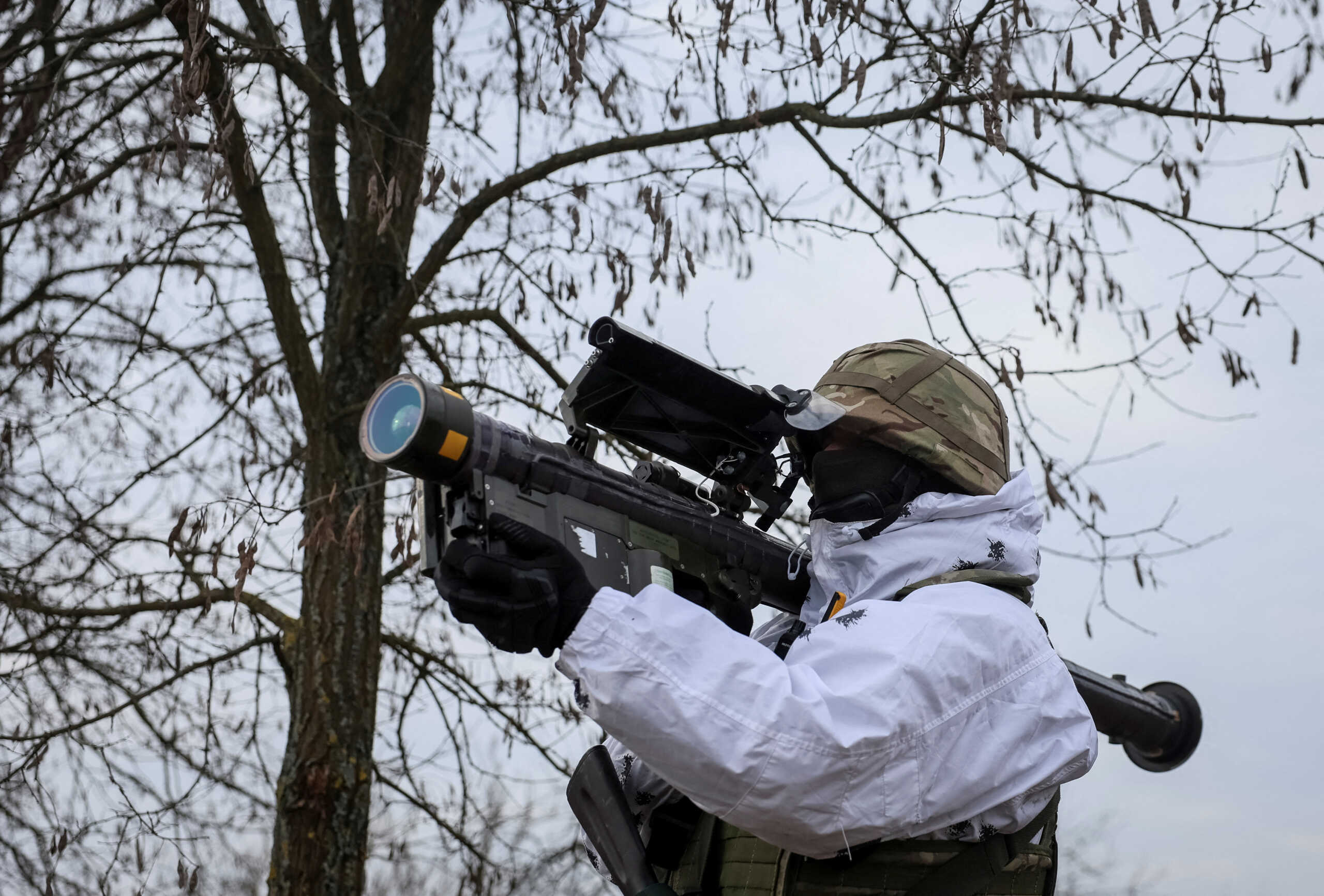 FILE PHOTO: A Ukrainian serviceman holds a Stinger anti-aircraft missile as he attends a joint drills of armed forces, national guard and Security Service of Ukraine (SBU) near the border with Belarus, amid Russia's attack on Ukraine in Rivne region, Ukraine February 11, 2023. REUTERS
