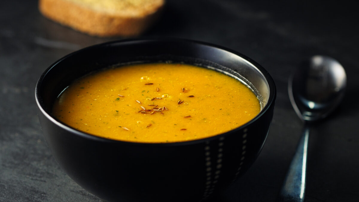 Home made freshness butternuts squash and red lentils soup with cumin and red chilli