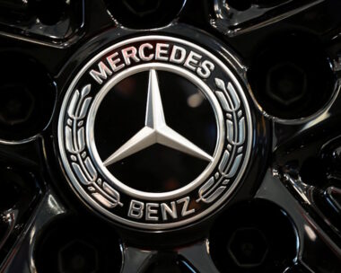 A logo of Mercedes-Benz