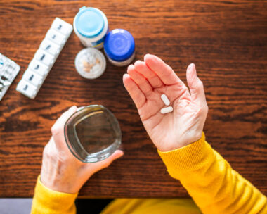 Senior woman taking a medical pill