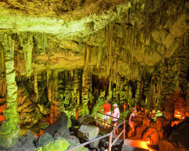 Crete, Greece - July 20, 2014: Cave of Zeus (Psychro Cave) in the Lasithi district on Crete island, tourists discover the cave.
